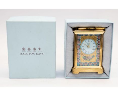 Halcyon Days - a boxed enamel clock, decorated in a floral design&nbsp;&nbsp;