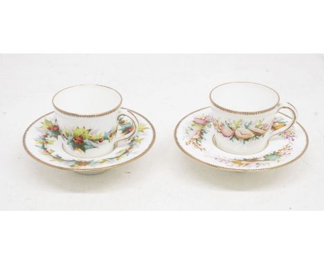 19th Century chocolate cups and saucers, one decorated in Holly design and the other with sea shellsin good condition