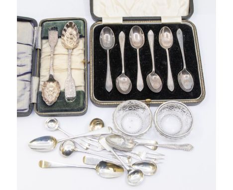 A collection of silver to include; a cased set of ornately engraved berry spoons, Dublin, 1827, James Brady, a cased set of s