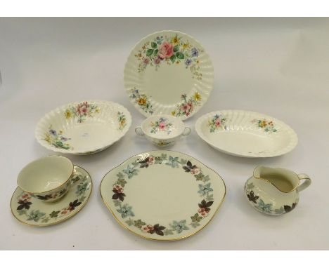 A Royal Doulton "Arcadia" six place dinner service including: dinner and side plates, soup bowls and coupes, 2 oval tureens, 