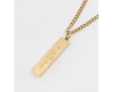 A 9ct gold ingot, London 1976, length approx 45mm, suspended from a 9ct gold flat curb link chain, length approx 22'', total 