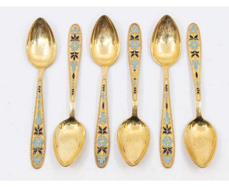 A cased set of six Russian silver-gilt teaspoons with enamel decoration depicting flowers, marked 875, box has Russian mark t