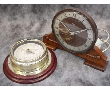 A stylised wooden Smith's mantle clock along with a Metamec England wood and brass barometer
