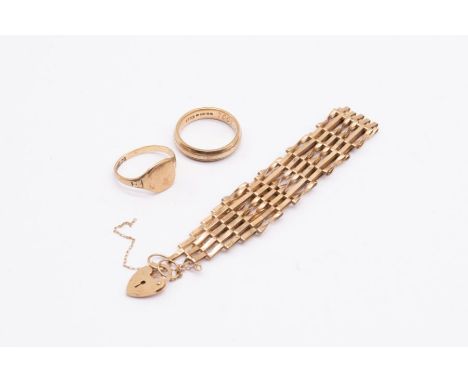 A 9ct gold gate bracelet with padlock clasp, a/f safety chain snapped, along with a 9ct gold signet ring, size J, a two tone 