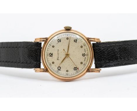 A vintage Helvetia gents 9ct gold wristwatch, comprising a round silvered dial with Arabic and dot hour markers, outer second