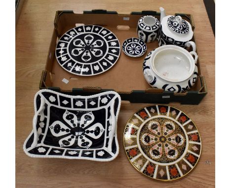 A collection of Crown Derby ceramics to include one Imari and some blue and white blanks: A large 1128 Imari cake stand, Blan