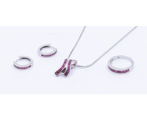 A collection of ruby and 18ct white gold jewellery to include a ruby set half eternity ring, comprising a row of nine channel