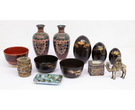 A pair of Asian Cloisonné dragon decorated vases, a red ceramic bowl with marks to base and black and gold design to side, tw