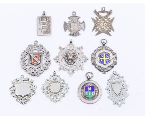 A collection of six silver fob medallions, various shapes and designs, to include four with enamel decoration, one  inscribed