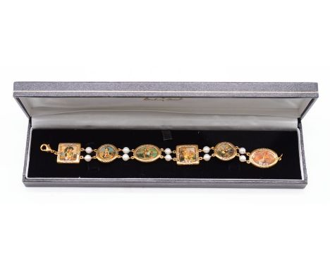 A Danbury Mint M.I. Hummel bracelet, yellow metal, length approx 18.5cm, cased