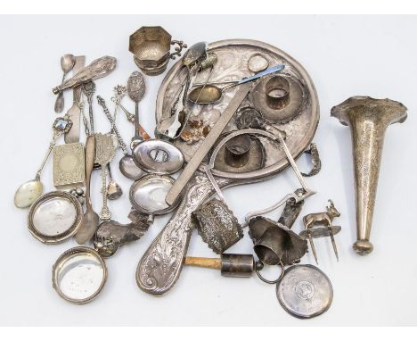 A collection of silver to include: Mostly broken or missing parts, including one silver mirror back, a comb top, three pocket