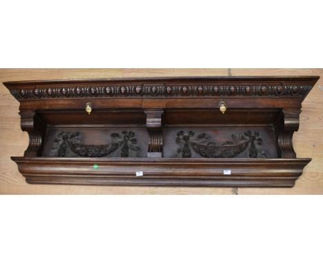 A 19th century oak overmantel, two drawer shelf with Adams-style carved detail, together with a 19th century fireguard with f