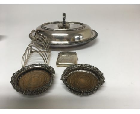 A silver toast rack a silver cigarette case ,pair of coasters and a silver plated tureen
