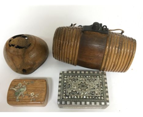 An oriental type wooden keg, a possible carved wood nut and two mother of pearl boxes