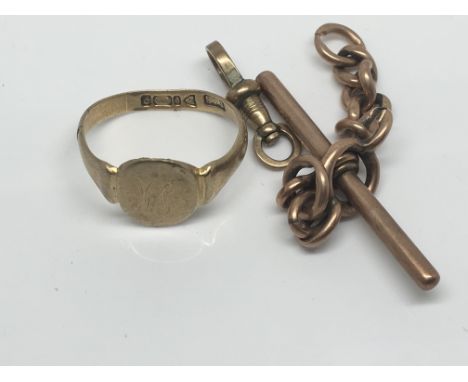 A 9ct Gold signet ring a gold bar with attached chain links, weight 12g approximately. 