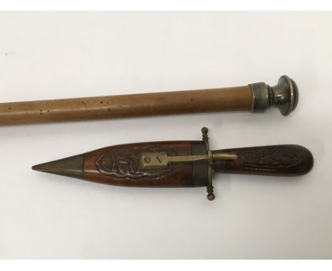 A silver topped swagger stick and a Kukhri knife (2).