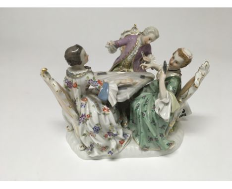 A Meissen  group depicting three figures  playing a card game  ,good condition 