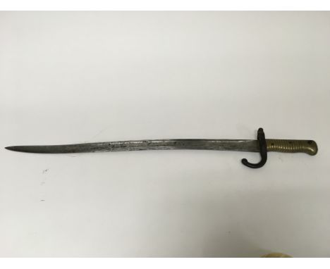 A similar French WW1 M1866 bayonet without s scabbard or embossed numbers.