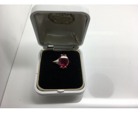 A 9ct gold ring with red stone. Weight approx 3g Size approx K/L