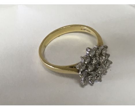 An 18ct Gold diamond cluster ring, ring size R. 