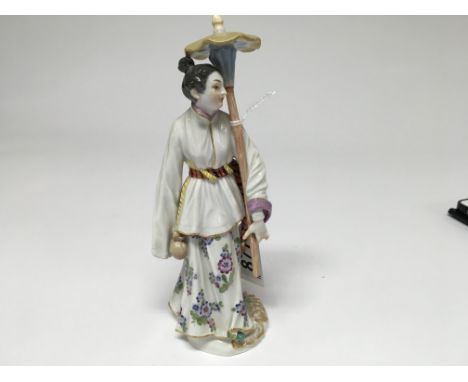 A Meissen figure depicting a orential figure with lantern 17 cm