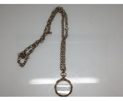 A 9ct Gold open link necklace with attached open fronted portrait locket. 