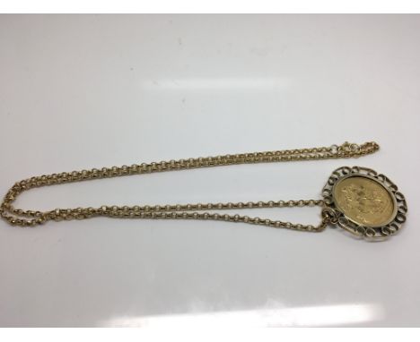 A Victorian sovereign dated 1896 in gold mount with attached chain