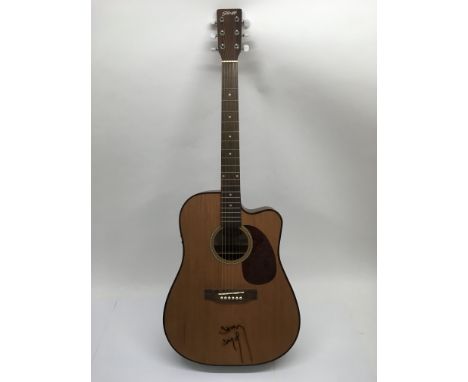 A signed Stagg semi acoustic guitar bearing the signature of actor Steven Seagal.