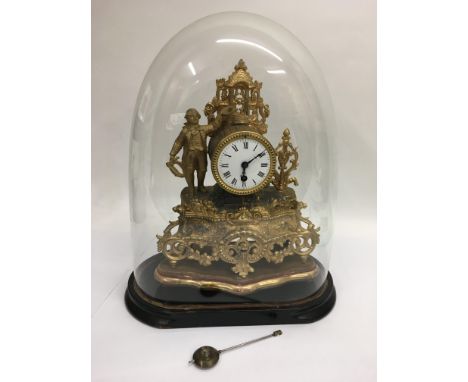 A speller figural mantle clock under a glass dome, approx height 43cm (including dome).