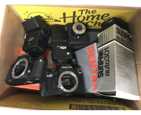 A box of camera equipment and bodies.