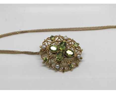 A 9 ct  Edwardian style gold broach / pendant  inset with seed pearl and citrine with attached chain 