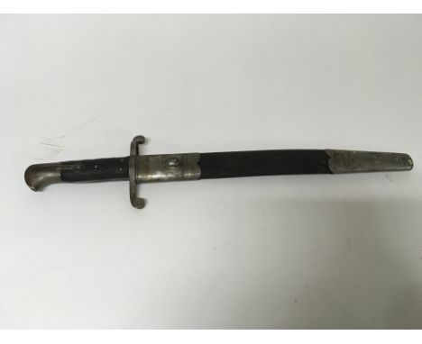 An unusual WW2 era bayonet with Signs of German design and British markings, including a scabbard