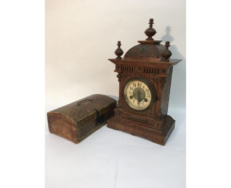 A Continental walnut eight day mantle clock and a dome topped leather box (2).
