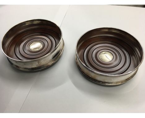 A pair of 925 silver wine coasters.Diameter approx 13cm