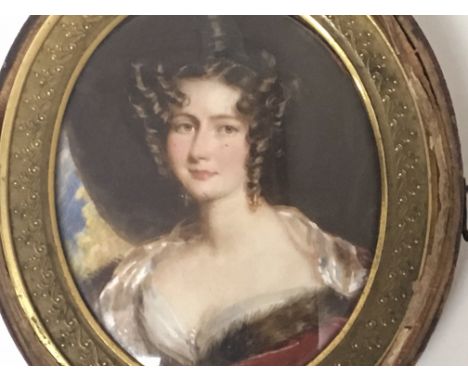 A Quality Early 19th Century hand painted portrait miniature of a lady and one other conforming of a gentleman, on ivory, (on