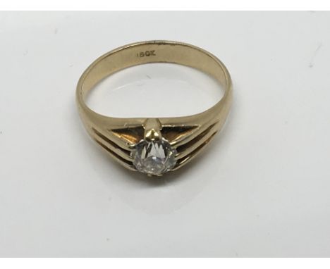 An 18ct Gold ring set with an old cut diamond approximately .9ct ring size R, 