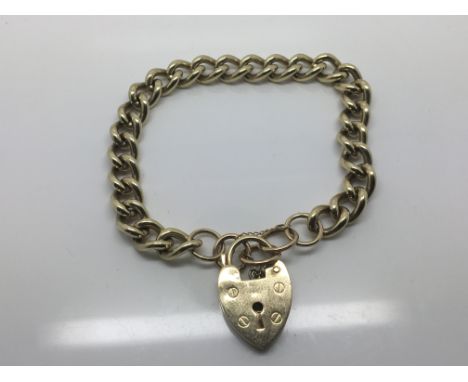 A 9ct Gold open chain link bracelet with attached padlock clasp. Weight 33g approximately.