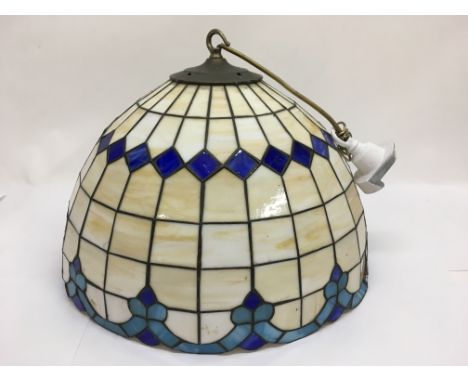 A Tiffany style lamp shade.