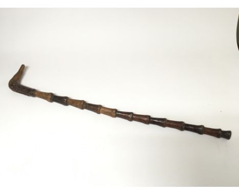 An old native carved walking stick