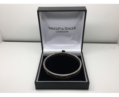 A boxed Wright & Teague silver bangle marked 925.