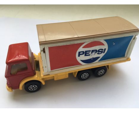 A rare pre production Matchbox Superkings Pepsi cola lorry with a yellow chassis, red cab and light brown roof. The model num