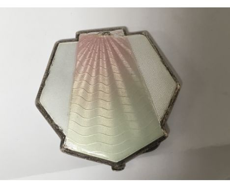 An Art Deco Silver and enamel compact. 