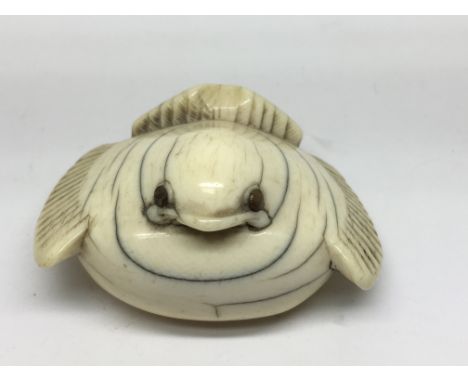 A well detailed, signed, carved ivory Japanese netsuke formed as bird.Approx 6cm long