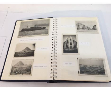 Military interest. An album of circa 1920's and 30's photographs and postcards of British army soldiers abroad and in the UK.