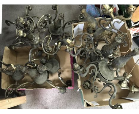 A collection of vintage brass ceiling lights.