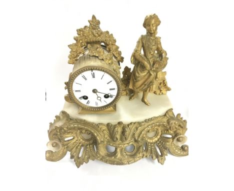 A gilt metal and marble mantle clock with mounted lady and enamel dial 29cm 