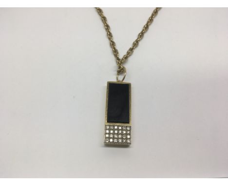 A modern design 18ct gold pendant set with a four rows of diamonds with attached 9ct gold chain, approximately 23g.