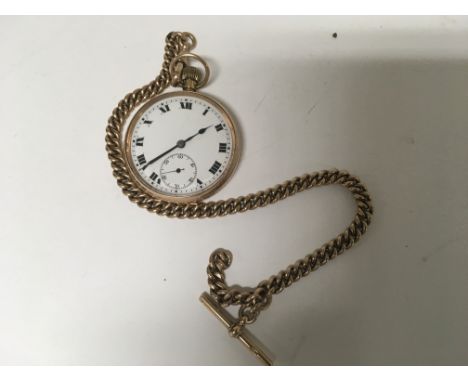 A 9ct button wind pocket watch the enamel dial with Roman numerals and second subsidiary dial with 9ct chain 46 grams 