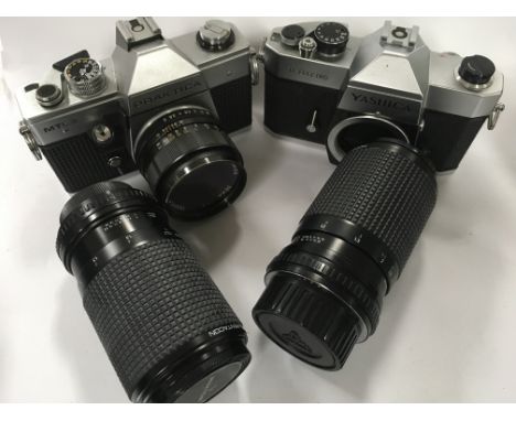 A collection of vintage camera equipment including cameras by Praktica, Yashica, Kodak together with KLB englarer etc
