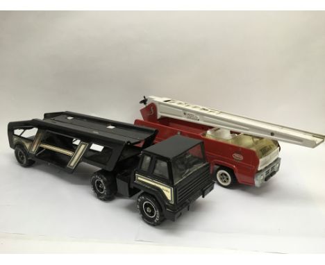 A Tonka car transporter and a Tonka fire engine (2).